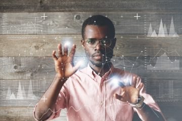 man in shirt surrounded by data science imagery
