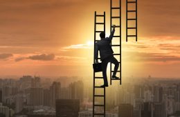 Image of man climbing ladder